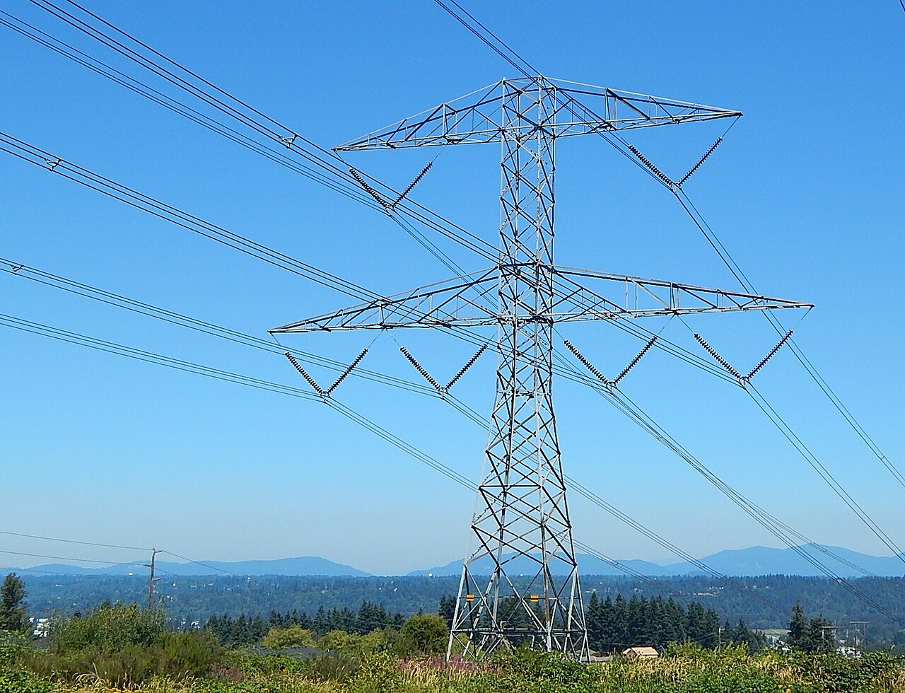 A high-voltage transmission tower and its suspended conductors in Auburn, Washington.